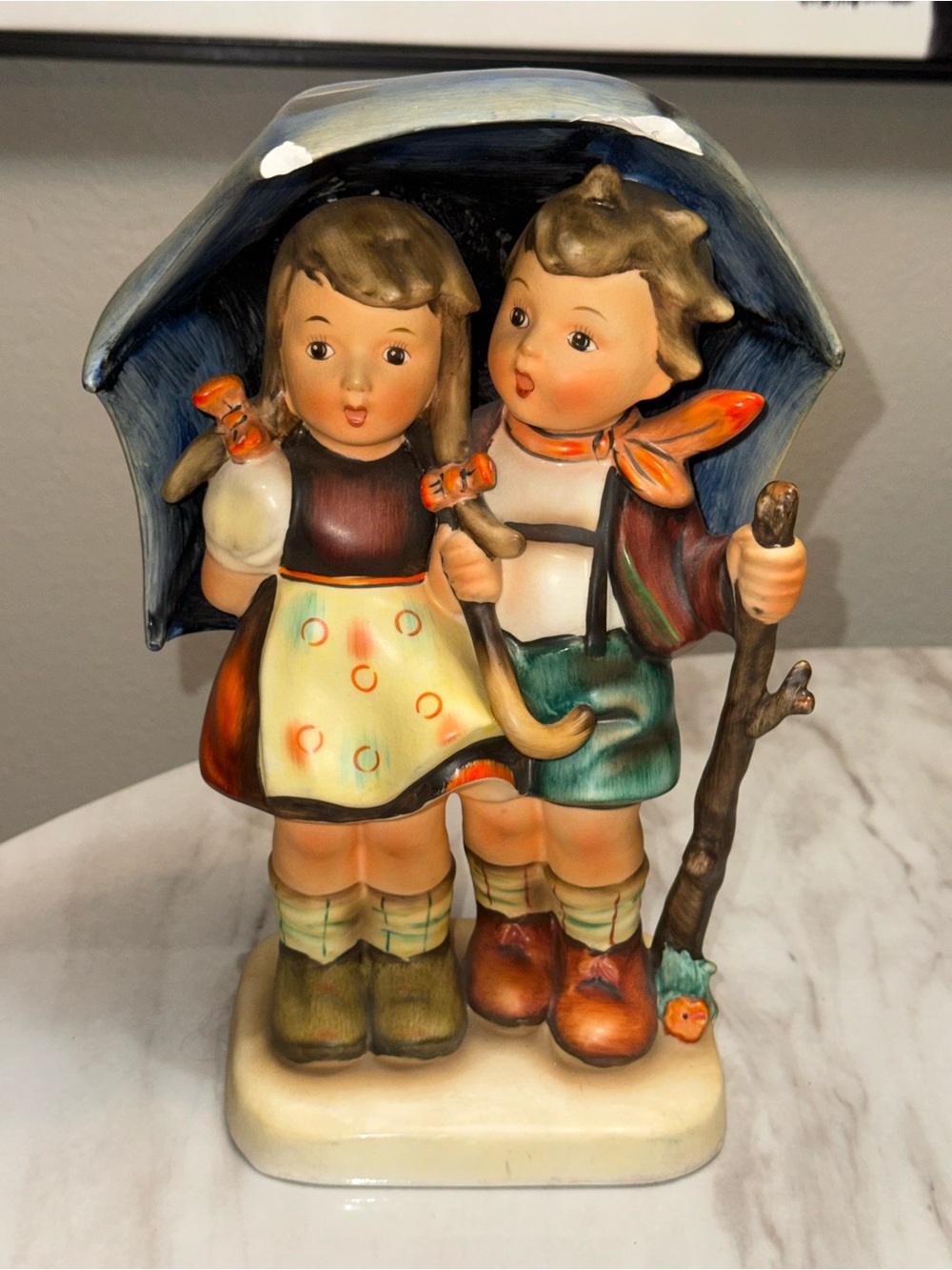 "Stormy Weather" (HUM 71) porcelain figurine by M.I. Hummel / Goebel 1937
